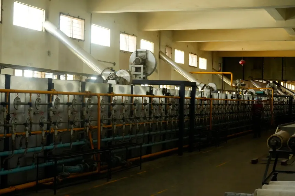 Baking ovens and orange gas lines inside the Sumo plant